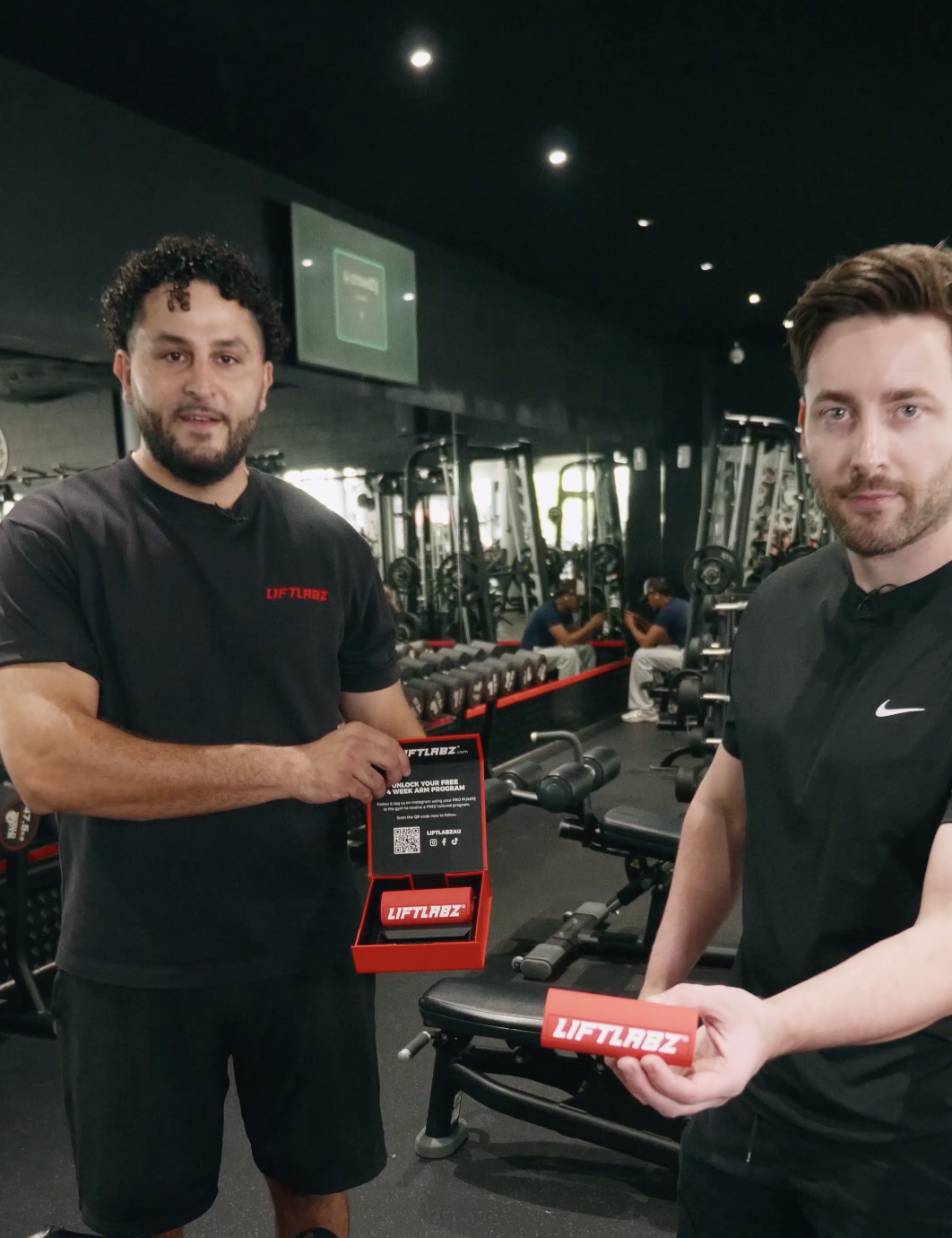 LIFTLABZ founders demonstrating PUMPZ setup in the gym